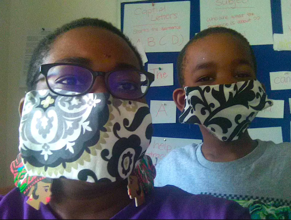Brittany Williams and her son wearing masks