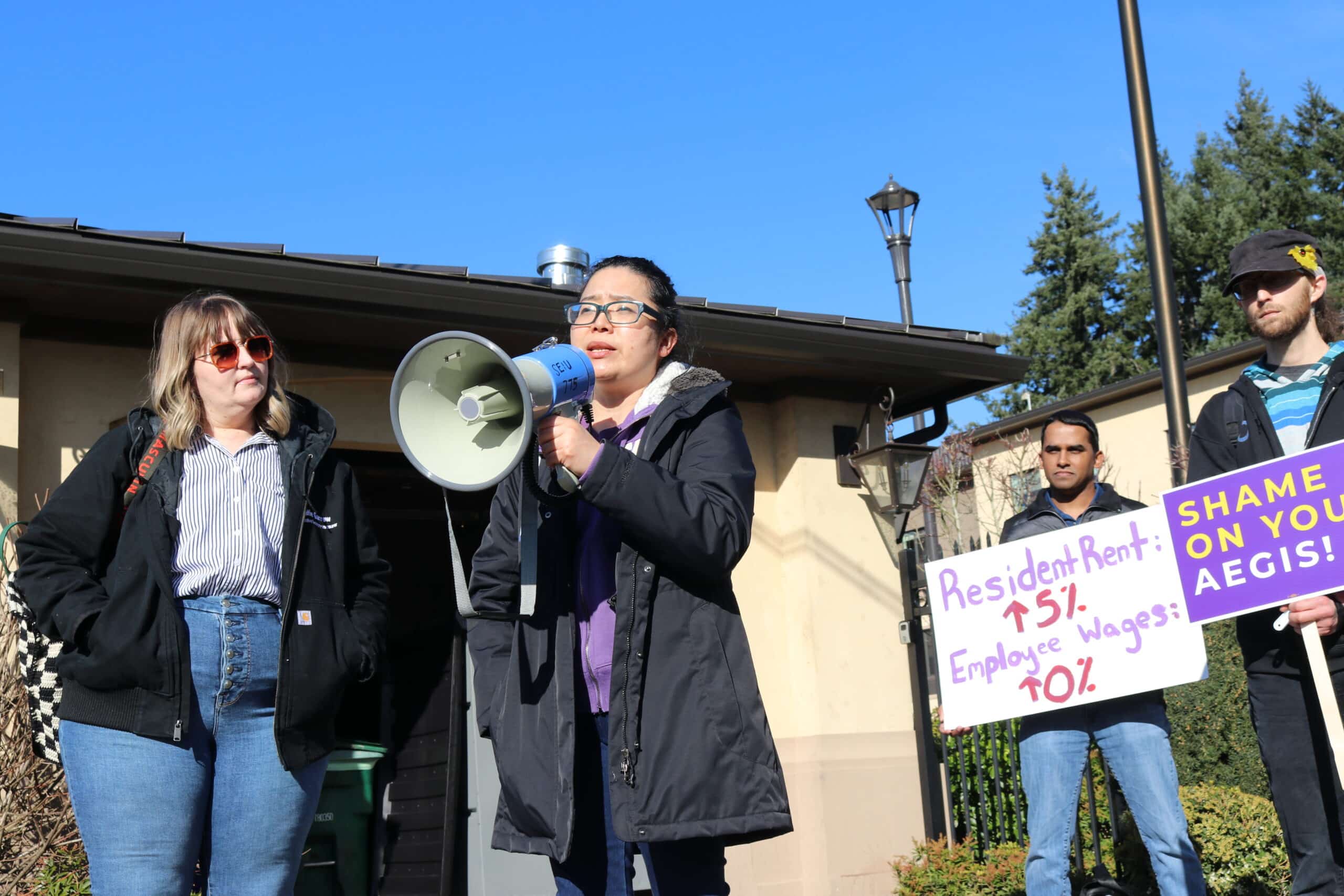 A caregiver speaks with a megaphone