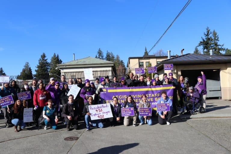 Group photo of Aegis Living Ravenna workers rallying for living wages