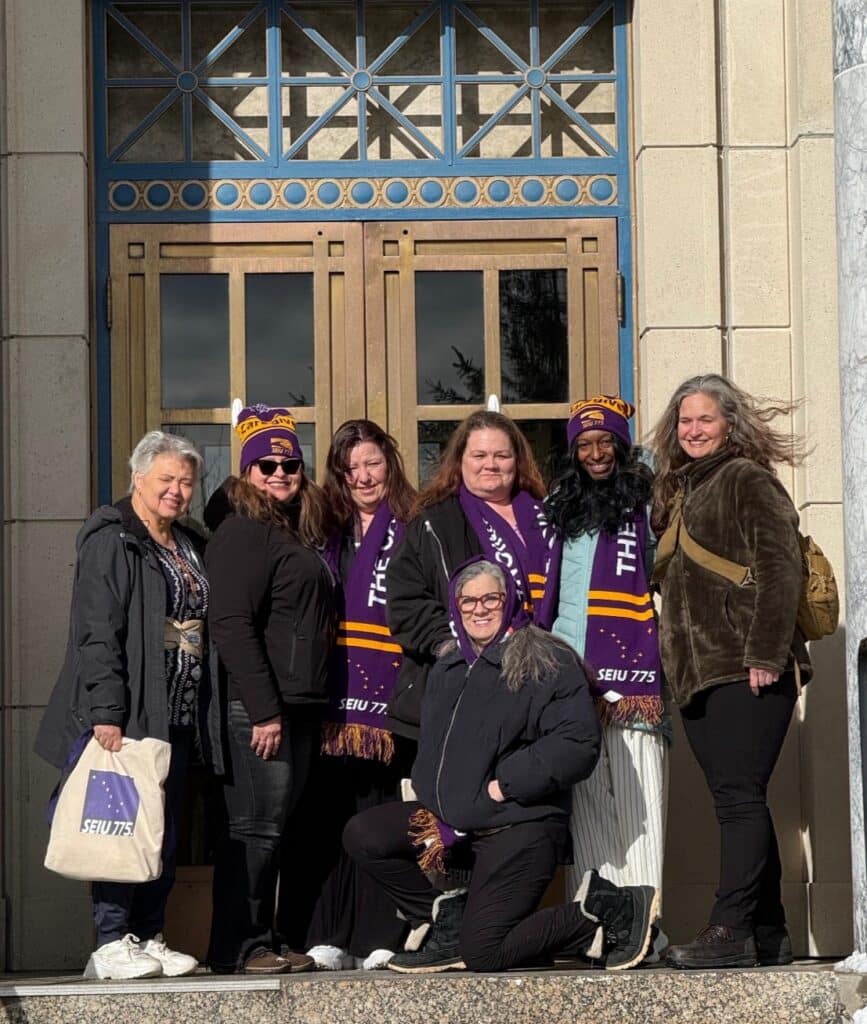 Kandee (front) and Alaska caregivers at the Alaska State Capitol 